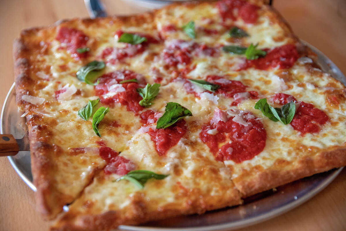 The Marge pizza, grandma style, with mozzarella, sauce, basil, evoo, and grated permigiano reggiano at Pizzeria da Laura in Berkeley, Calif. on March 23, 2023.