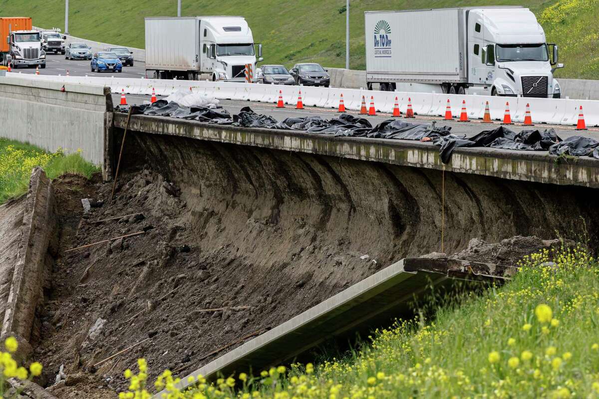 A section of eastbound Interstate 580 near Livermore cracked and a retaining wall tumbled down a rain-soaked hill during the past week's storms.