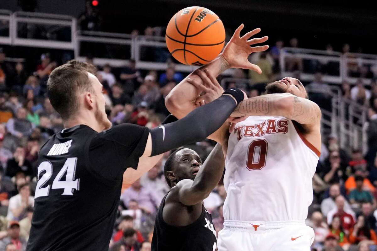 University of Texas basketball Longhorns laughing all the way