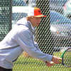 Edwardsville's Colton Hulme prepares to serve against Alton on Saturday inside the EHS Tennis Center. Hulme won 6-0, 6-0 in the No. 2 singles spot. 