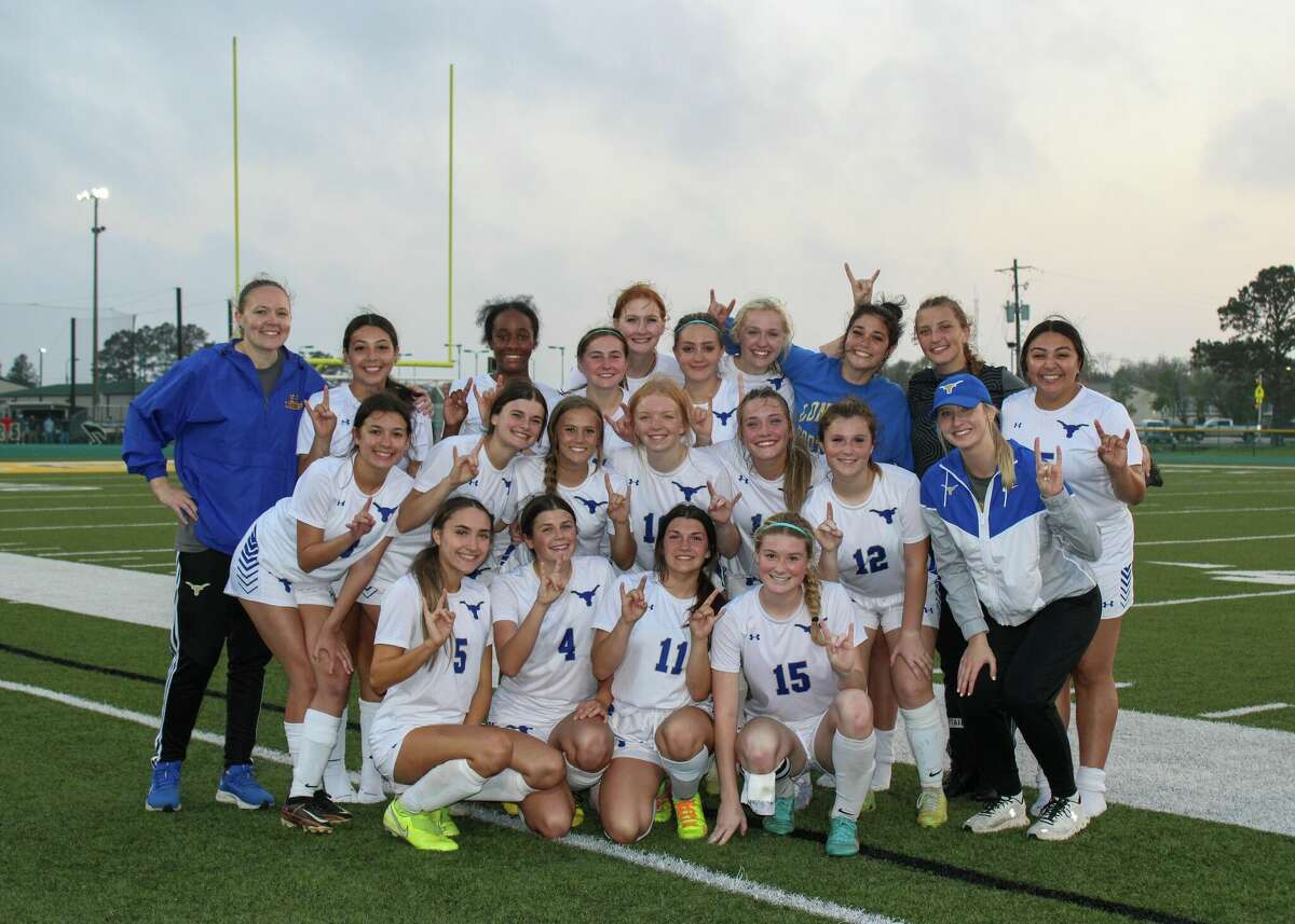 The Hamshire-Fannett girls soccer team poses after a first-round playoff win last week.