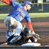 Father McGivney's AJ Sutberry steals third base against Bushnell on Saturday at Blazier Field in O'Fallon.