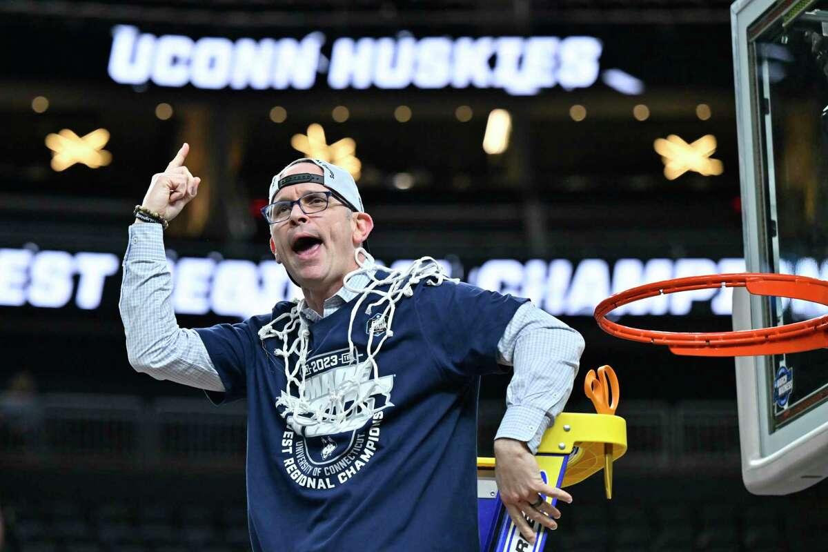 UConn head coach Dan Hurley celebrates after cutting down the netting from the 82-54 win against Gonzaga of an Elite 8 college basketball game in the West Region final of the NCAA Tournament, Saturday, March 25, 2023, in Las Vegas.