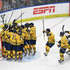 No. 2 Quinnipiac celebrates after their 4-1 win over Ohio State in the NCAA Division I men's hockey championship quarterfinal game at Total Mortgage Arena in Bridgeport, Conn. Sunday, March 26, 2023.