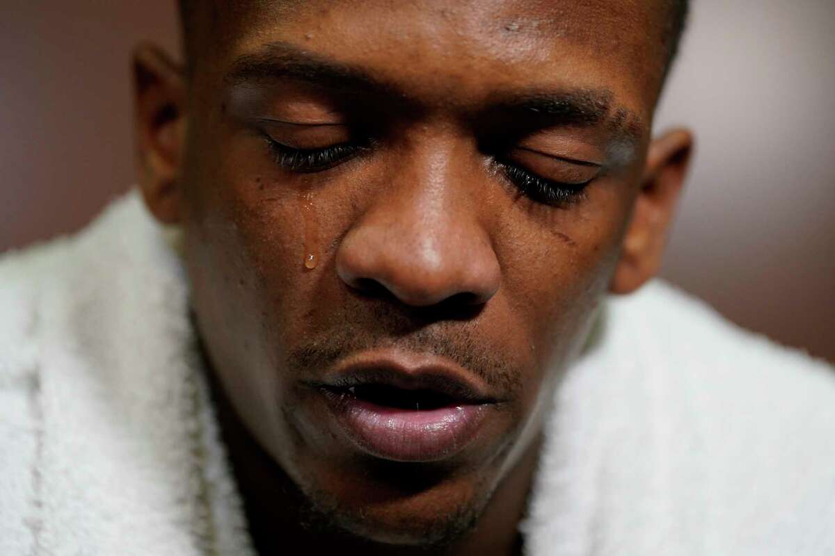Texas guard Sir'Jabari Rice sheds a tear in the locker room after their loss against Miami in an Elite 8 college basketball game in the Midwest Regional of the NCAA Tournament Sunday, March 26, 2023, in Kansas City, Mo.