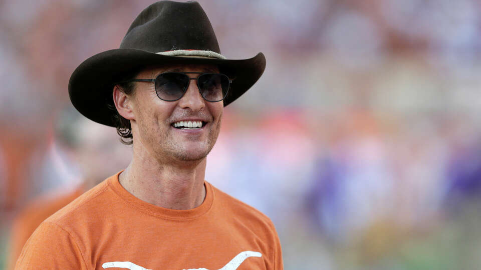 Matthew McConaughey watches player warmups in September 2019 in Austin, Texas. McConaughey was cited as a lucky charm on Sunday, before the Longhorns' loss.