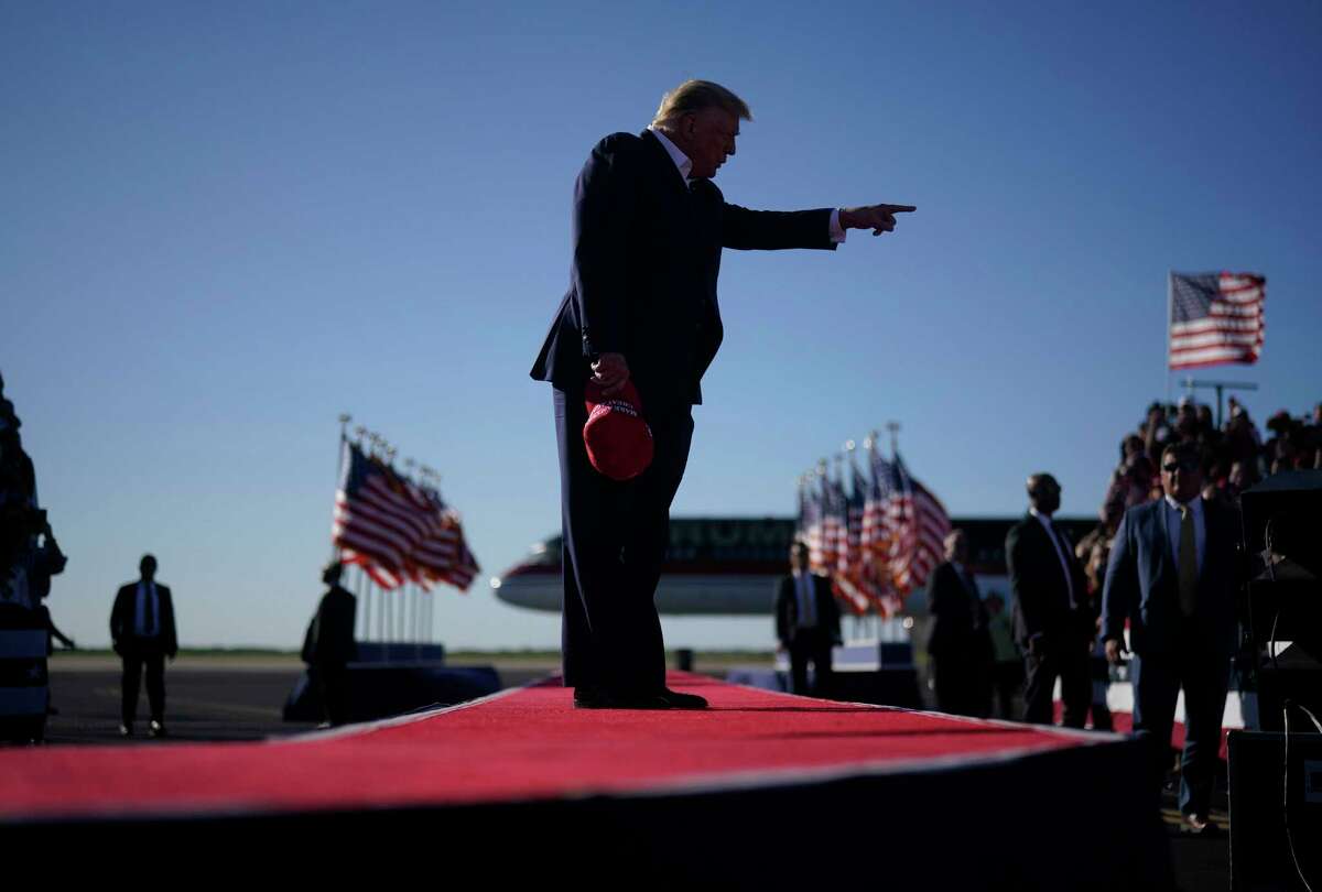 Former president Donald Trump arrives for a campaign rally at Waco Regional Airport in Waco, Tex., on Saturday. (