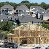 An under construction home is seen Wednesday, Oct. 26, 2022 in the Cibolo Canyons neighborhood near the TPC San Antonio golf resort. Rocketing Texas home prices have added to tax rolls and complaints about the state's property tax burden in recent years.