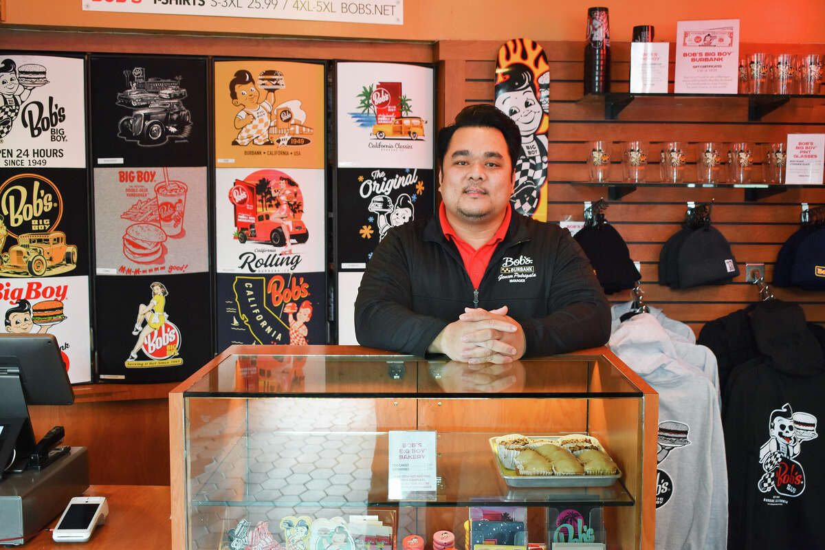 Gencer Pedrigala, Bob's Big Boy's marketing manager, greets customers during breakfast service.