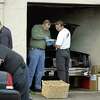**FILE** In this file photo federal agents along with police from Vallejo and Oakland, Calif., police search a garage at the home of Mark C. Anderson, owner of Sausalito Cellars in Sausalito, Calif., on Oct. 19, 2005. Federal prosecutors on Monday, March 19, 2007, announced a 19-count indictment against Anderson for starting a 2005 blaze that destroyed a warehouse and six million bottles of wine on Mare Island, a former Naval base in Vallejo, Calif., about 30 miles northeast of San Francisco. (AP Photo/Eric Risberg) Ran on: 05-29-2007 Mark Anderson Ran on: 05-29-2007 Mark Anderson