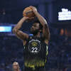 Andrew Wiggins of the Golden State Warriors shoots the ball in the first quarter against the Washington Wizards at Chase Center on February 13, 2023 in San Francisco, California.