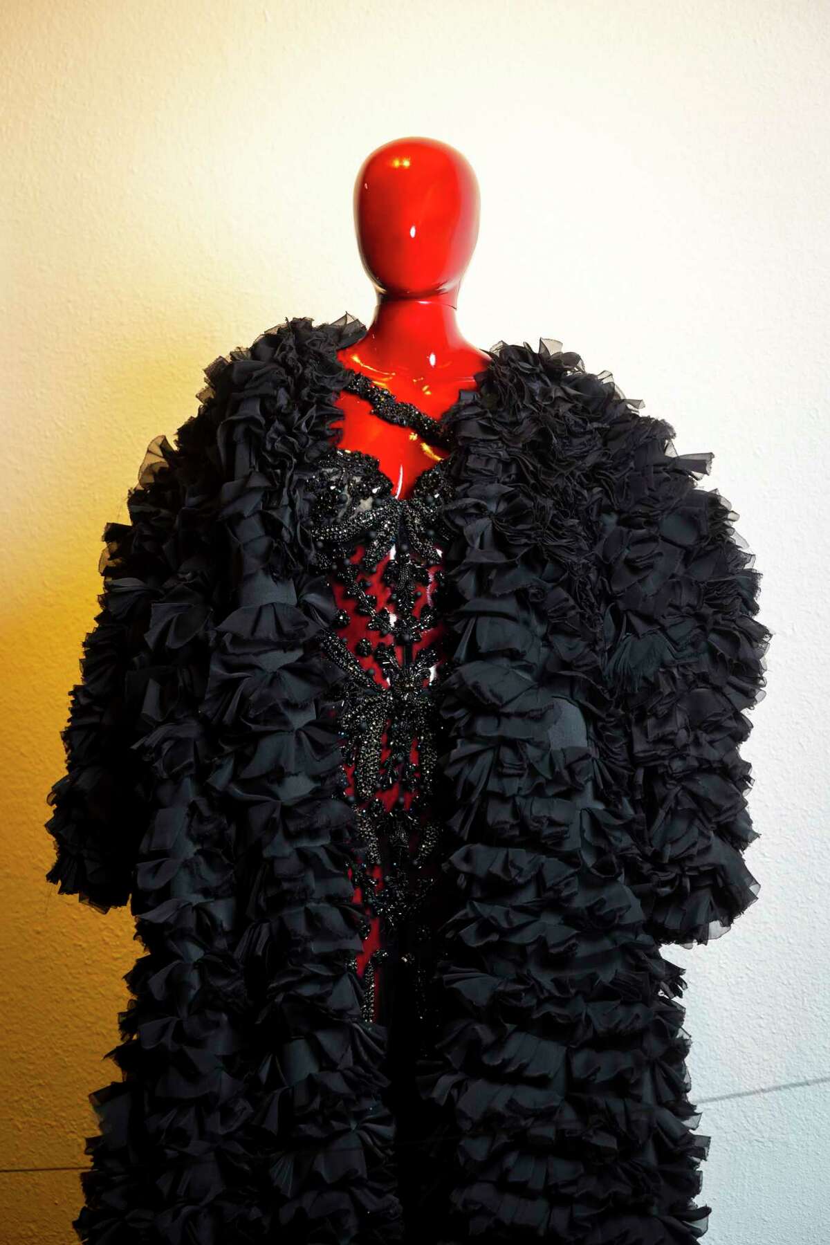 Mannequins clothed in Chasity Sereal’s wearable art stand on display at the Harris County Cultural Arts Council on Monday, March 27, 2023. The fashion exhibit, titled “Growing Pains: A Wearable Art Experience,” features 10 pieces from Sereal.