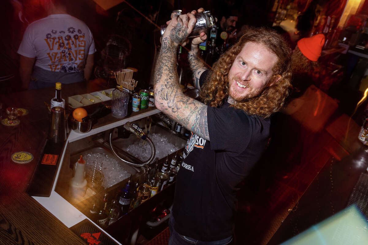 Kilowatt co-owner Rick Eusey shakes up a cocktail on a busy Friday night at the Mission District bar, March 10, 2023.