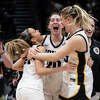 Iowa guard Gabbie Marshall, second from left, guard Kate Martin, third from left, and forward Monika Czinano, third from right, celebrate after an Elite 8 college basketball game of the NCAA Tournament against Louisville, Sunday, March 26, 2023, in Seattle. Iowa 97-83.