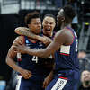 LAS VEGAS, NEVADA - MARCH 25: Nahiem Alleyne #4 of the Connecticut Huskies celebrates with teammates after scoring during the second half against the Gonzaga Bulldogs in the Elite Eight round of the NCAA Men's Basketball Tournament at T-Mobile Arena on March 25, 2023 in Las Vegas, Nevada. (Photo by Carmen Mandato/Getty Images)