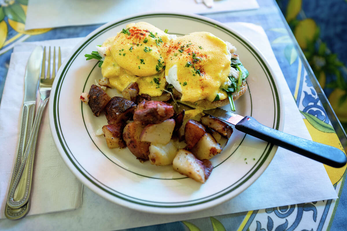 Dungeness Crab Benedict with Spinach from Mama's On Washington Square in San Francisco, Calif. on March 25, 2023.