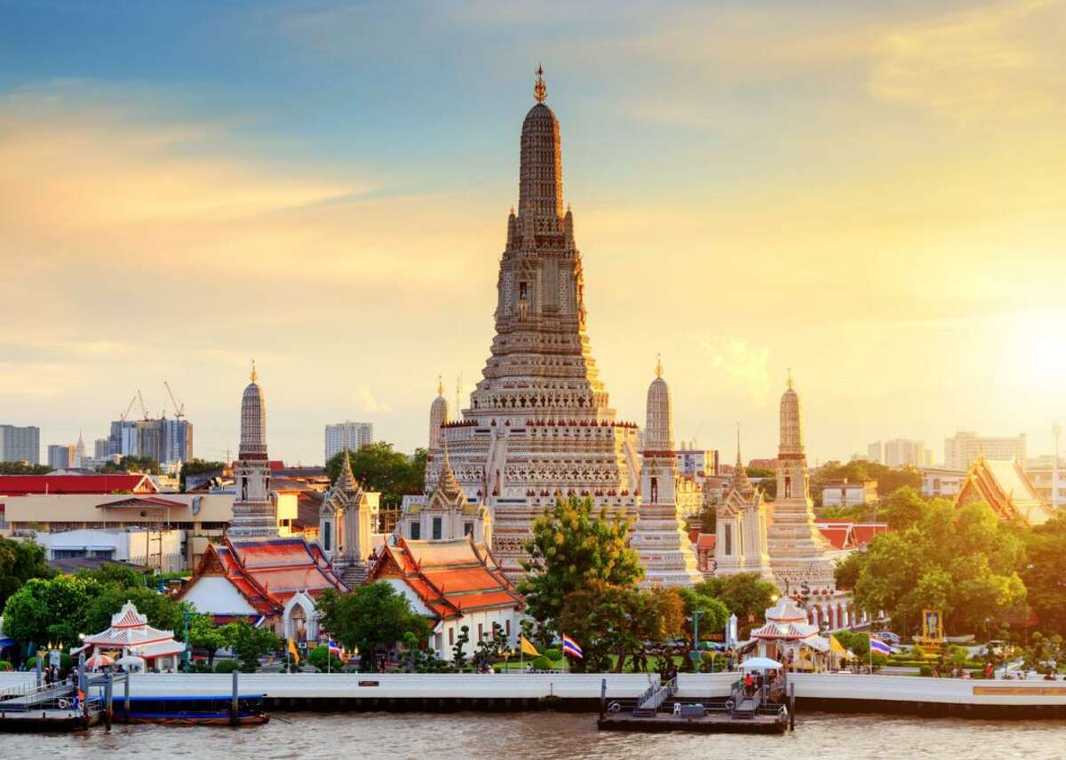 #10. Thailand - Cost index: 61.6% cheaper than the U.S. - Exchange rate: 34.81 Thai bahts to $1 - Region: Southeast Asia Thailand's capital city, Bangkok, is rich with historical and religious sites that tourists won't want to miss. One example is Wat Pho, a grand royal temple considered Thailand's first university, which costs less than $6 for admission. The northern province of Phuket is another popular Thai destination, full of breathtaking beaches and an active nightlife.