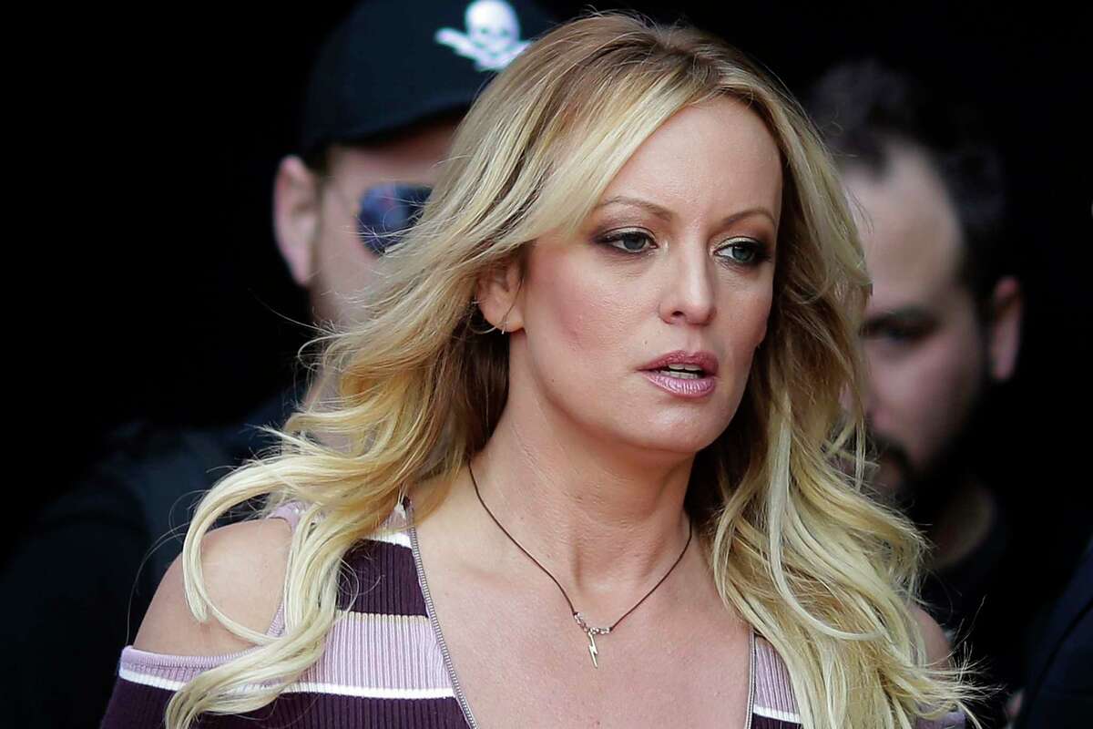 FILE - Adult film actress Stormy Daniels arrives for the opening of the adult entertainment fair Venus in Berlin, Oct. 11, 2018. A lawyer for Donald Trump said Thursday, March 30, 2023, that he has been told that the former president has been indicted in New York on charges involving payments to Daniels made during the 2016 presidential campaign to silence claims of an extramarital sexual encounter.