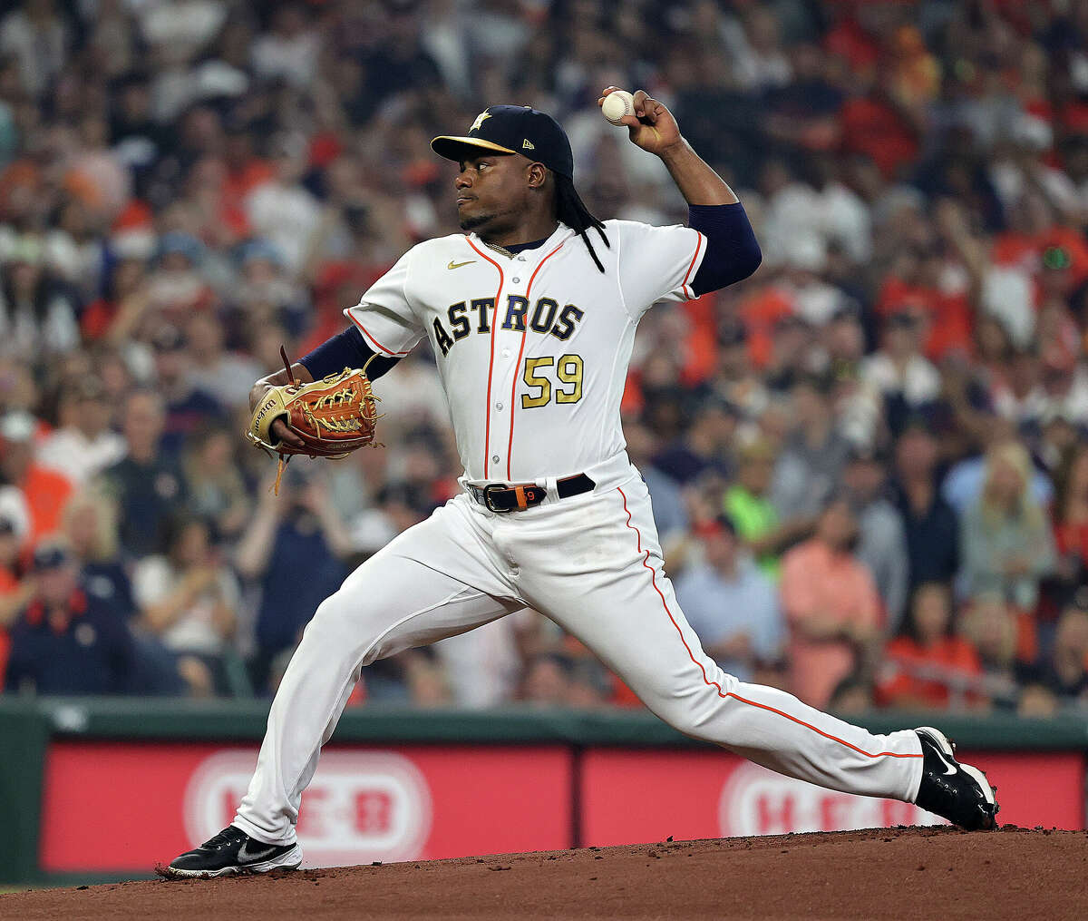 HOUSTON, TEXAS - MARCH 30: Framber Valdez #59 of the Houston Astros pitches in the first inning against the Chicago White Sox on Opening Day at Minute Maid Park on March 30, 2023 in Houston, Texas. (Photo by Bob Levey/Getty Images)