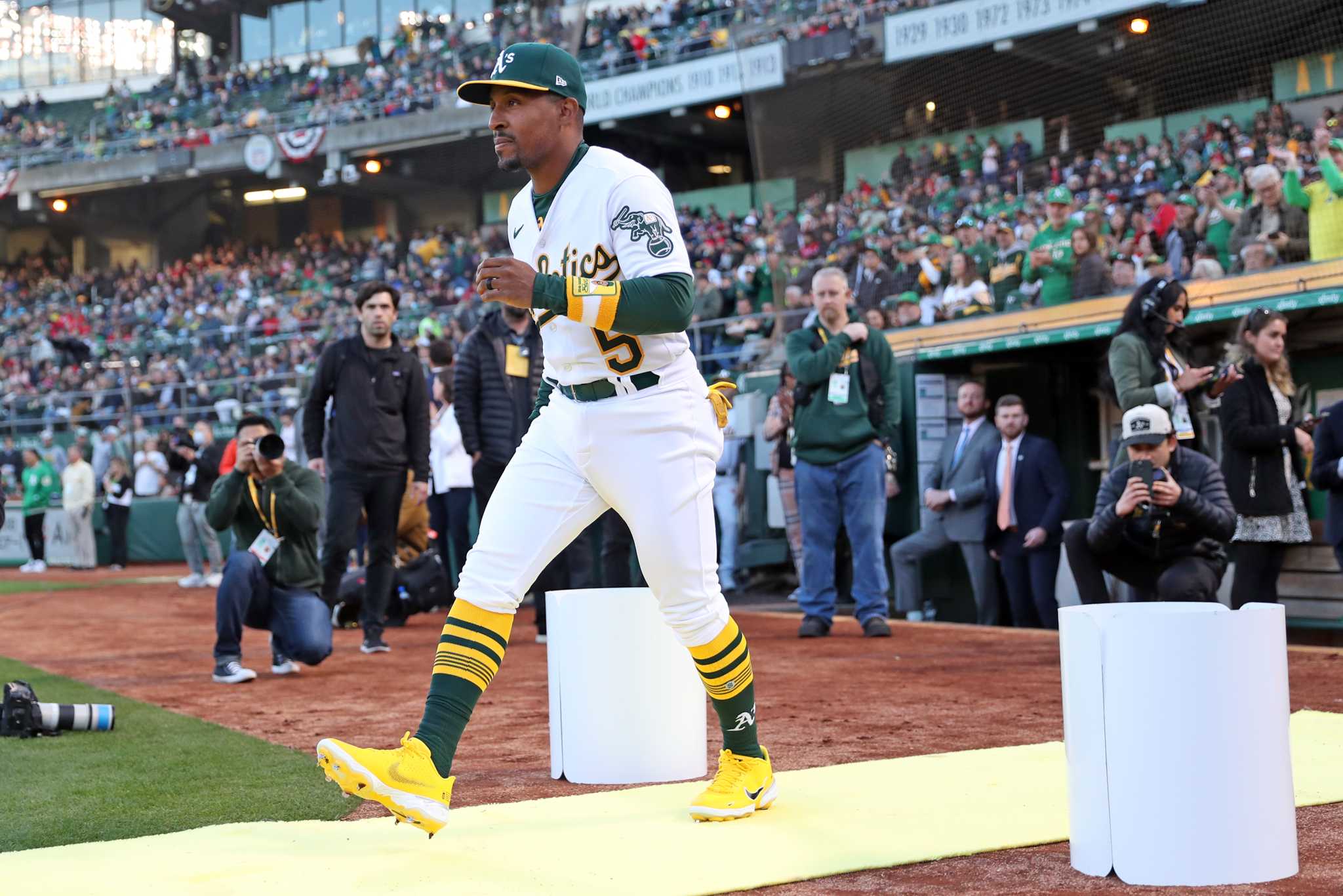 Oakland A's rally late to beat Angels in opener