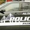 An Alton Police officer was hurt Thursday night when a suspected drunk driver struck a police vehicle.