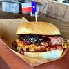The Bexar Burger with double cheese and brisket on top at Bexar Barbecue in Tomball.