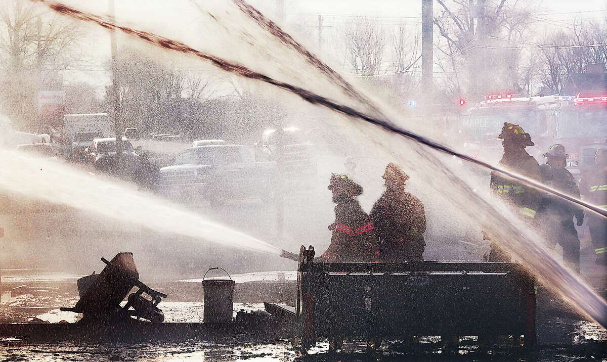 Four departments battle windfueled Meadowbrook fire