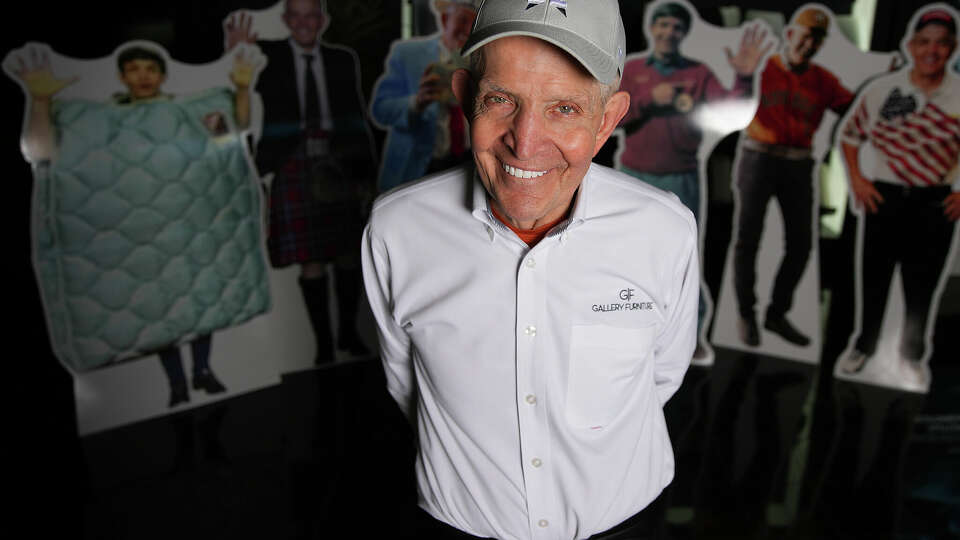 Jim “Mattress Mack” McIngvale stands with cutouts of him throughout the years at Gallery Furniture on Thursday, March 30, 2023 in Houston.Thursday, March 30, 2023 in Houston.