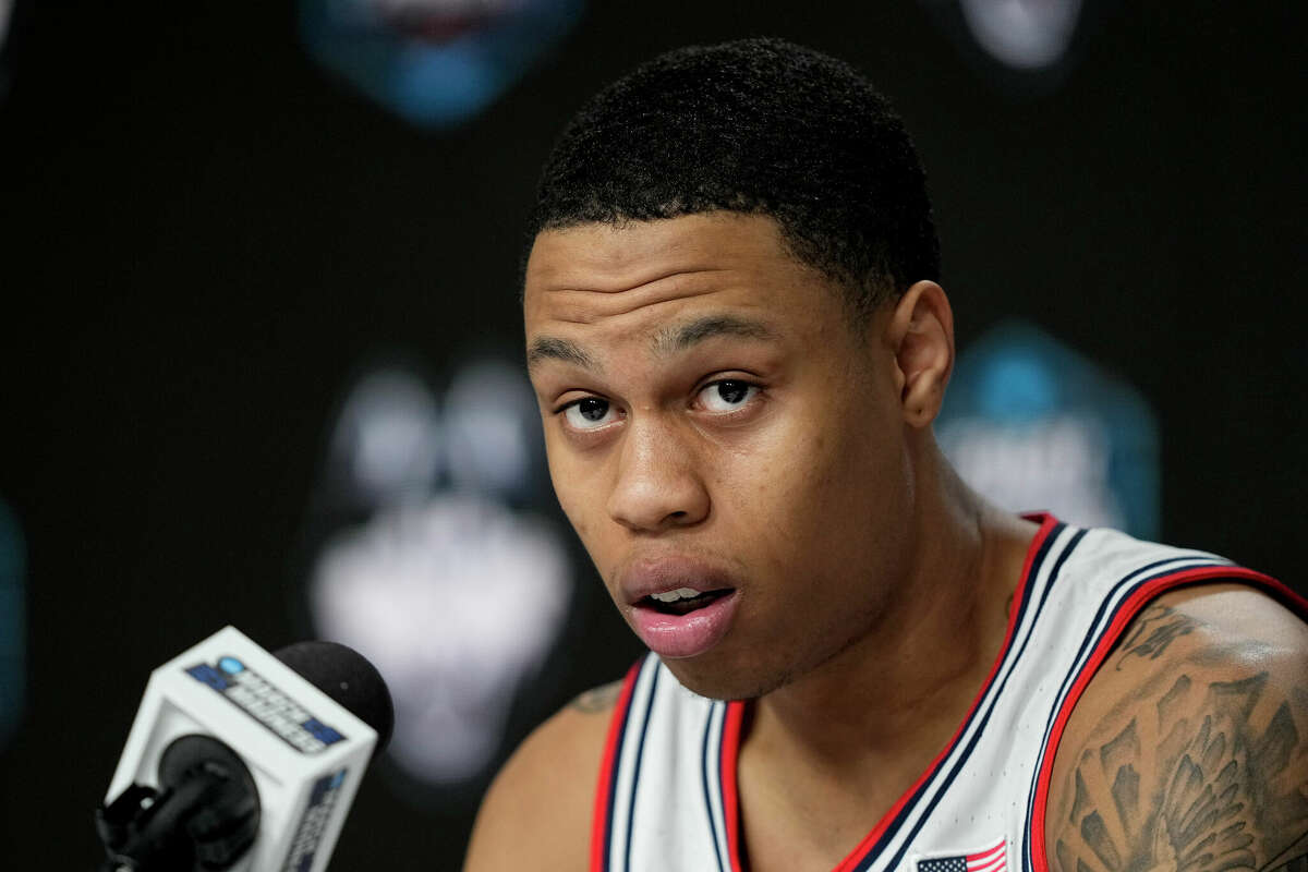 Connecticut guard Jordan Hawkins speaks during a press conference in preparation for the Final Four basketball game in the NCAA Tournament on Thursday, March 30, 2023, in Houston.  Miami faces Yukon on Saturday.  (AP Photo/David J. Phillip)