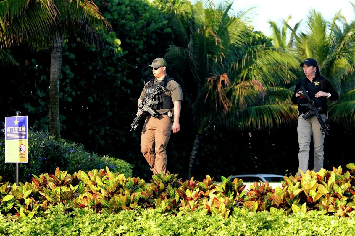 Secret Service agents patrol on the property of former President Donald Trump's Mar-a-Lago estate, Sunday, April 2, 2023, in Palm Beach, Fla. Trump was indicted by a Manhattan grand jury Thursday.
