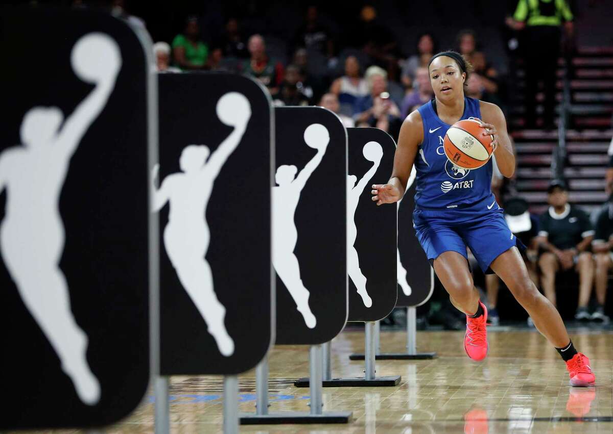 FILE - Minnesota Lynx's Napheesa Collier competes in the skills challenge during the WNBA All-Star festivities Friday, July 26, 2019, in Las Vegas. March Madness may have been the last time for fans to see many of the talented college women players compete. Players' options for professional basketball careers are limited, whether in the U.S. or overseas — the jobs just aren't there.