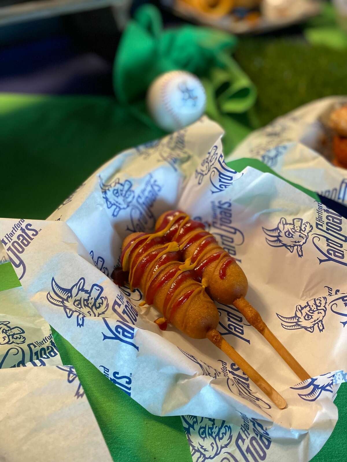 The classic corn dog is among the snacks at Dunkin' Park this season.