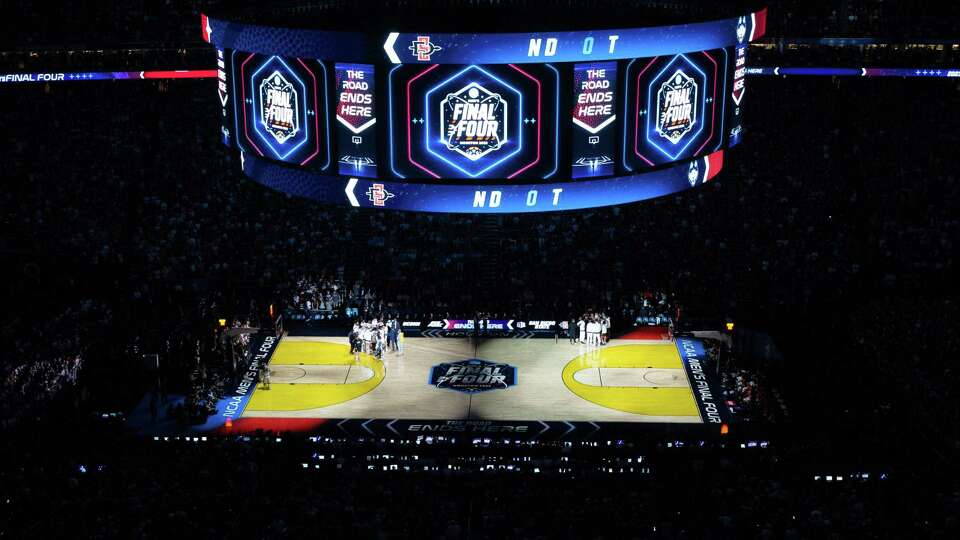 UConn and San Diego State players get ready to tip off the NCAA Division I Men's Basketball Championship game Monday, April 3, 2023, at NRG Stadium in Houston.