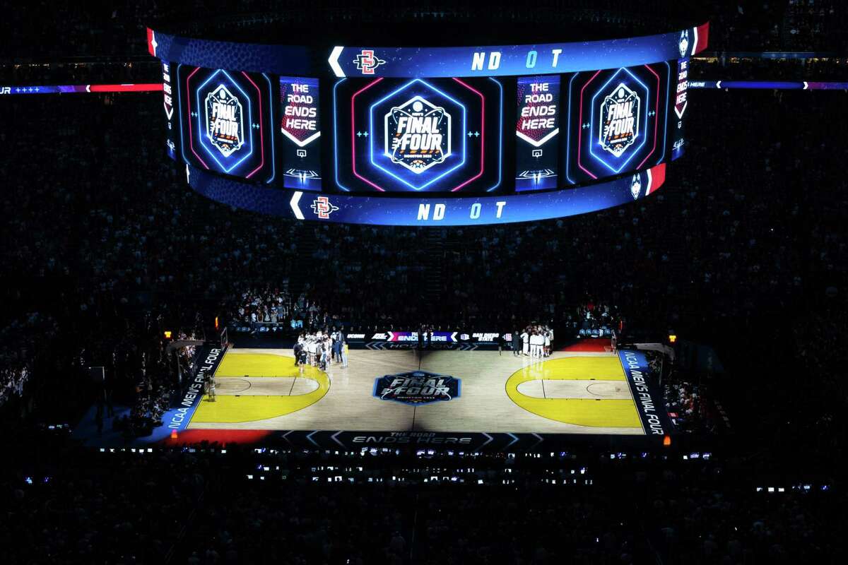 UConn and San Diego State players get ready to tip off the NCAA Division I Men's Basketball Championship game Monday, April 3, 2023, at NRG Stadium in Houston.