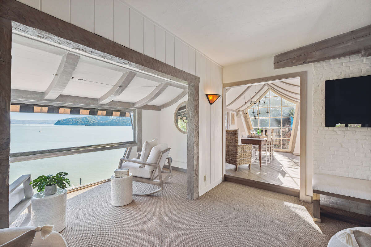 Fairytale cottage clinging to Belvedere Island hillside for sale