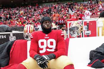 San Francisco 49ers defensive tackle Javon Kinlaw (99) runs onto the field  during an NFL football game against the Arizona Cardinals, Sunday, Jan.8,  2023, in Santa Clara, Calif. (AP Photo/Scot Tucker Stock