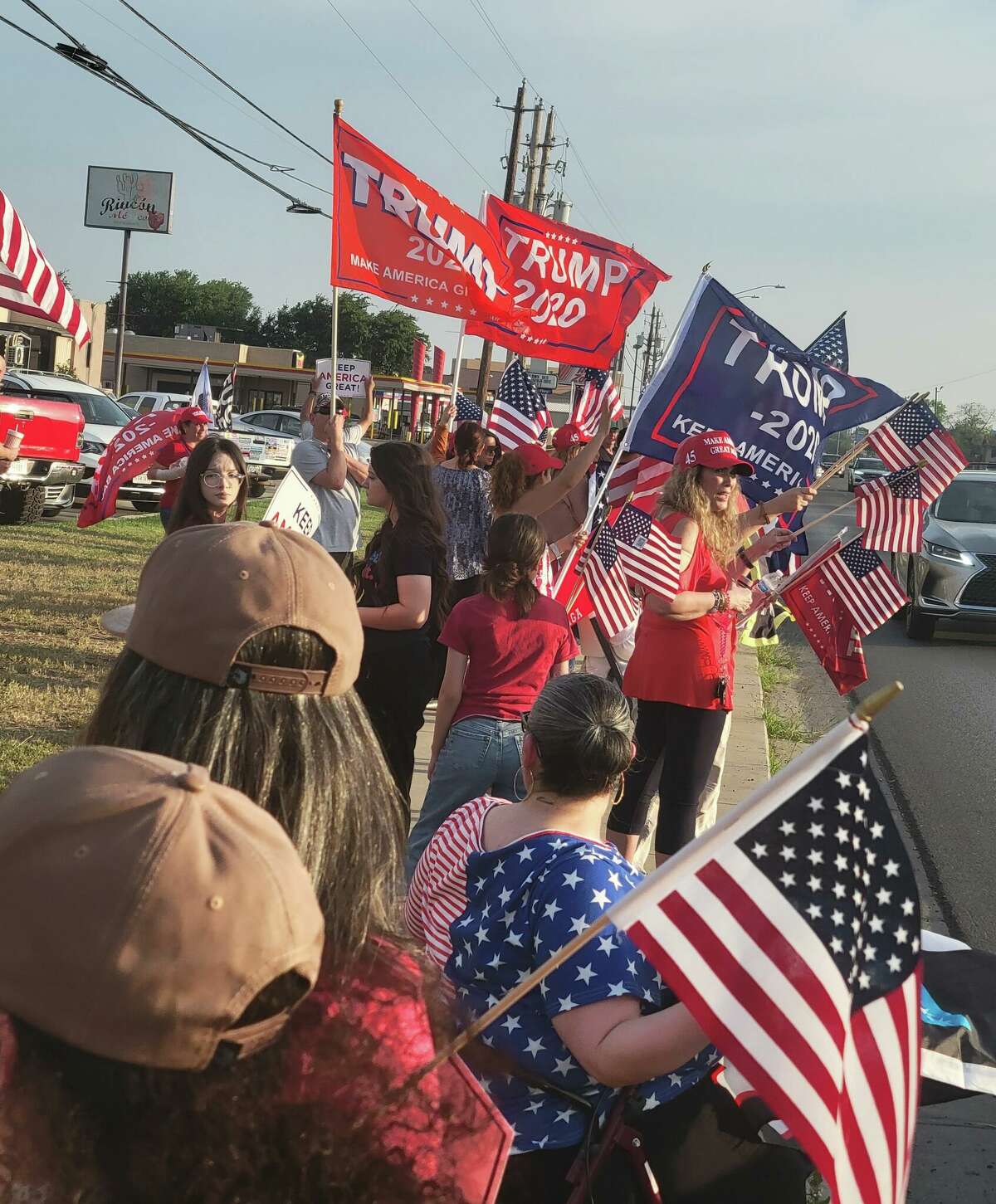 Dozens gathered in Laredo at 5516 McPherson Road for a flag-waving event to support former U.S. President Donald J. Trump on the day he was indicted in New York.