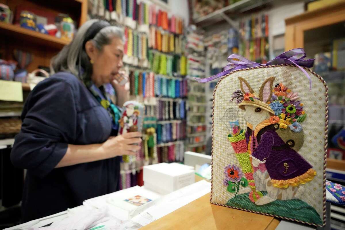 Needlepoint work done by Frances Jue, owner of Stitches in Time, 2421 Tangley St., is displayed Wednesday, April 5, 2023, in Houston.