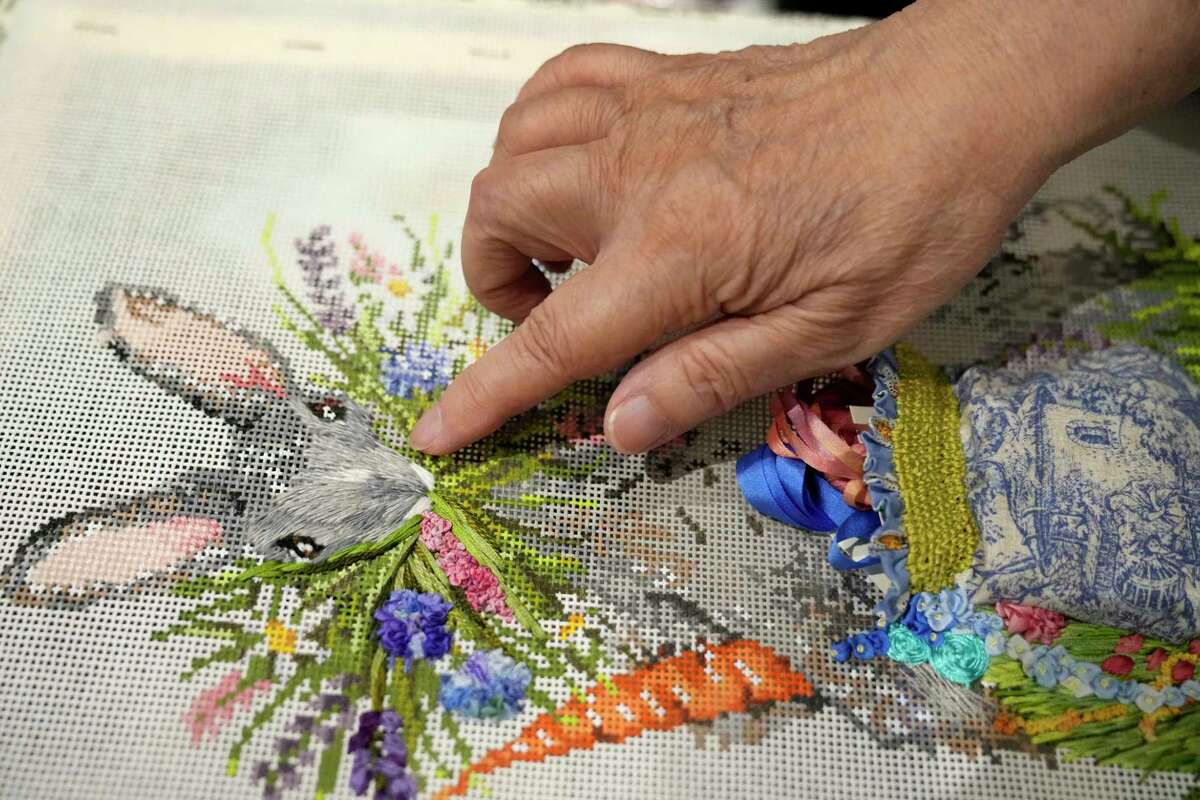 Frances Jue ,owner of Stitches in Time, 2421 Tangley St., talks about her work Wednesday, April 5, 2023, in Houston.