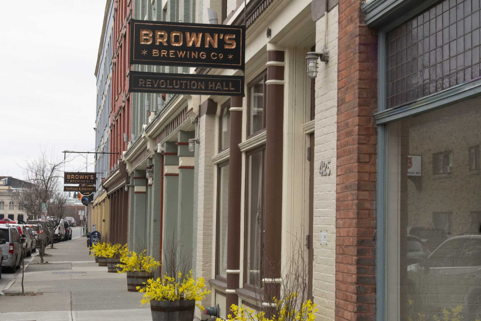 Troy police said the man was sent to the hospital after falling more than 10 feet from a rail lining a deck at the brew pub.
