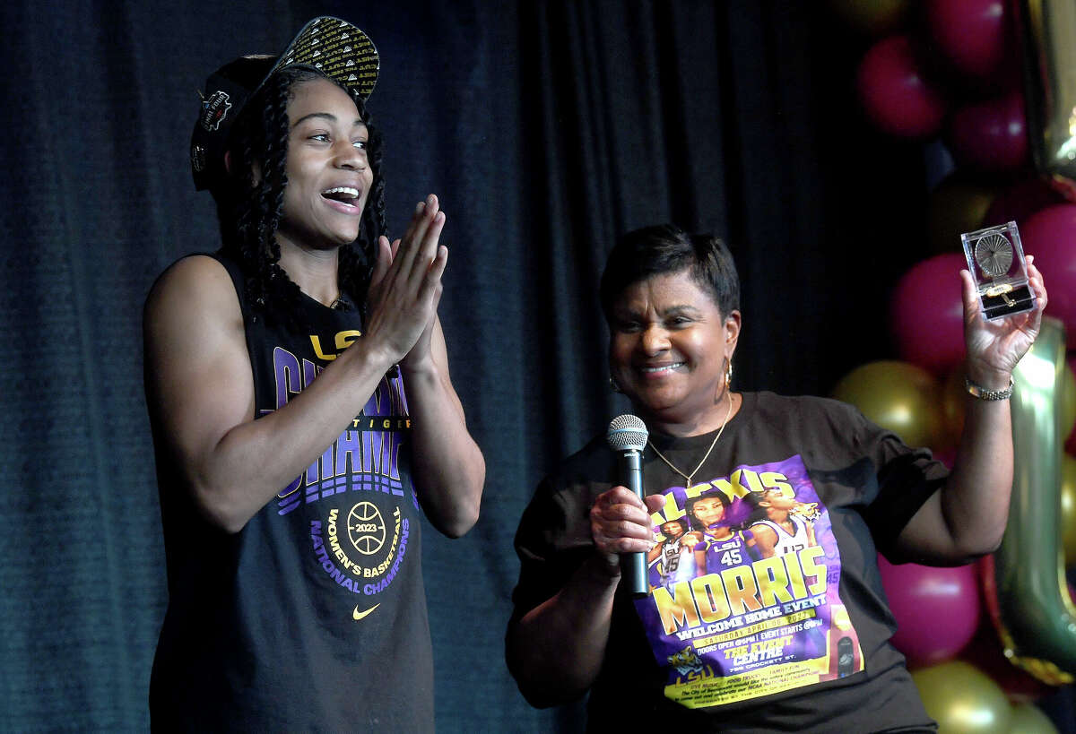 Alexis Morris reacts after Mayor Robin Mouton awards her the key to the city during a community celebration of hometown basketball stars Alexis Morris and the Beaumont United Timberwolves. Photo made Saturday, April 8, 2023 Kim Brent/Beaumont Enterprise