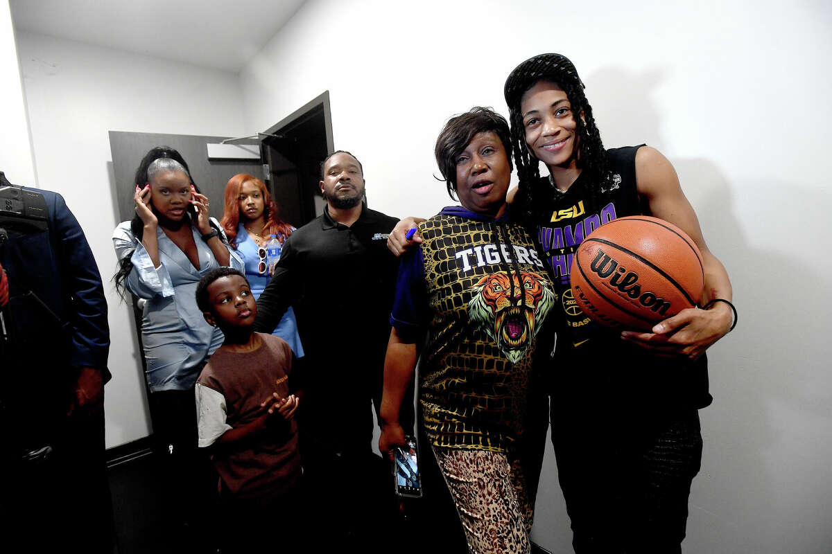 Alexis Morris gets a photo with fan Wanda Bodden after arriving for a community celebration of hometown basketball stars Alexis Morris and the Beaumont United Timberwolves. Photo made Saturday, April 8, 2023 Kim Brent/Beaumont Enterprise