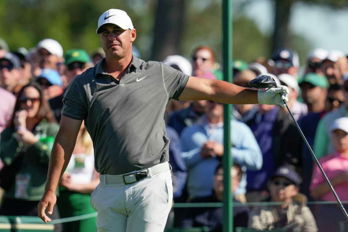 Brooks Koepka watches his tee shot on the eighth hole during the final round of the Masters golf tournament at Augusta National Golf Club on Sunday, April 9, 2023, in Augusta, Ga.
