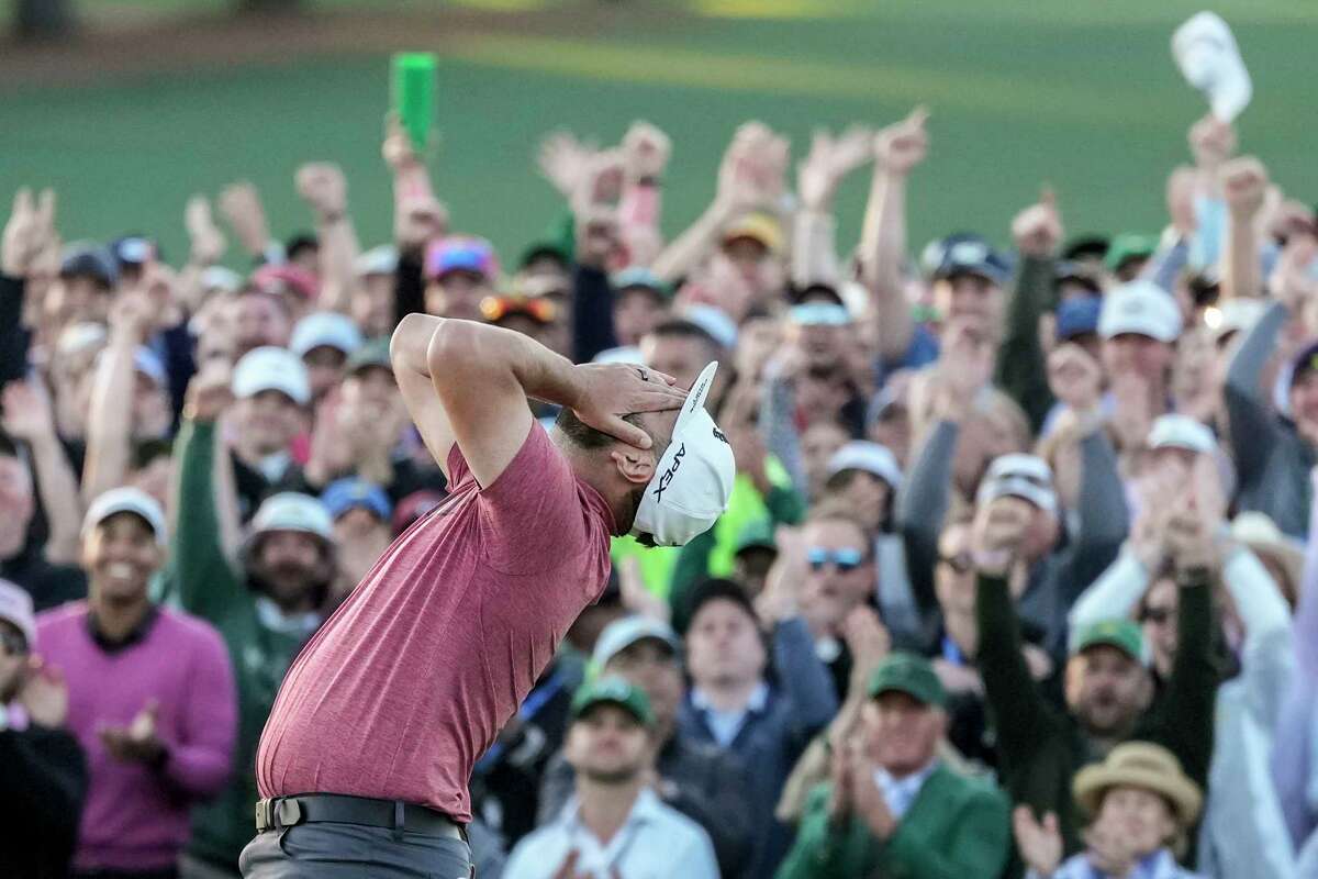 Jon Rahm, of Spain, celebrates on the 18th green after wining the Masters golf tournament at Augusta National Golf Club on Sunday, April 9, 2023, in Augusta, Ga.