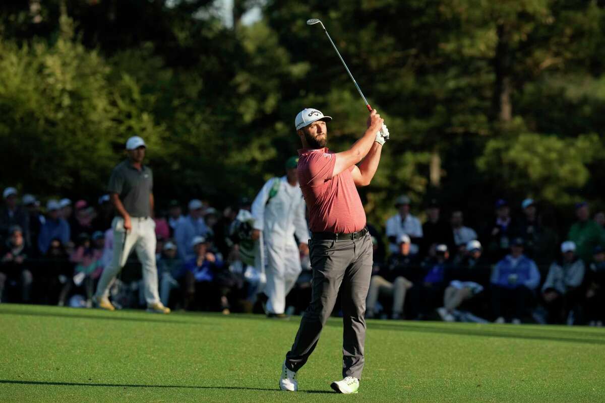 Jon Rahm, of Spain, hits from the fairway on the 15th hole during the final round of the Masters golf tournament at Augusta National Golf Club on Sunday, April 9, 2023, in Augusta, Ga.