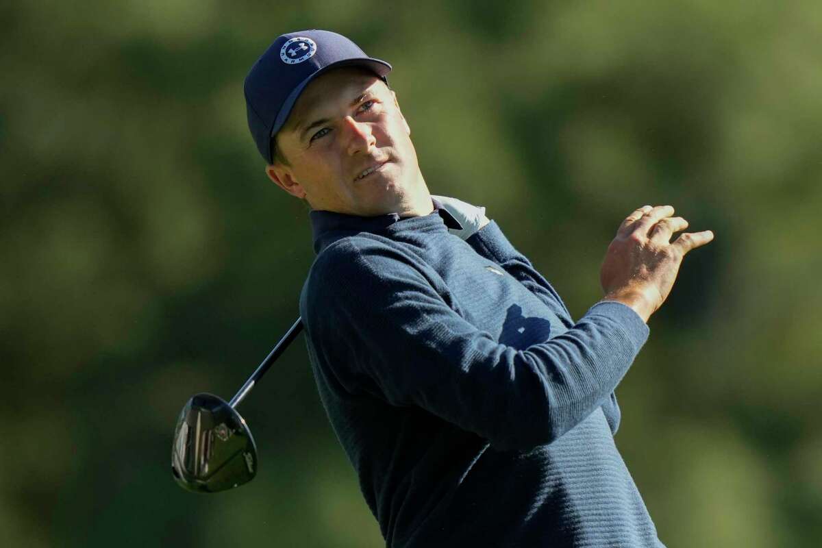 Jordan Spieth watches his tee shot on the 18th hole during the final round of the Masters golf tournament at Augusta National Golf Club on Sunday, April 9, 2023, in Augusta, Ga.