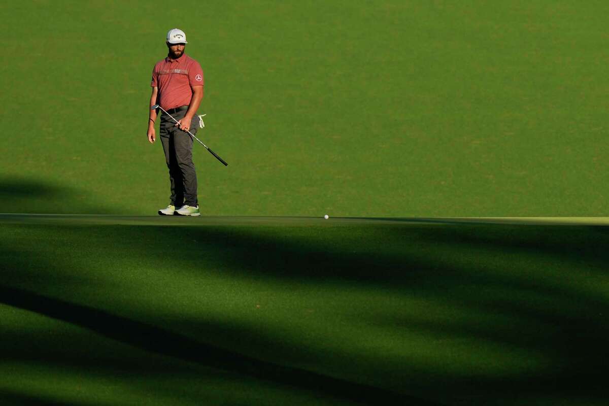 Jon Rahm, of Spain, watches his putt on the 15th hole during the final round of the Masters golf tournament at Augusta National Golf Club on Sunday, April 9, 2023, in Augusta, Ga.