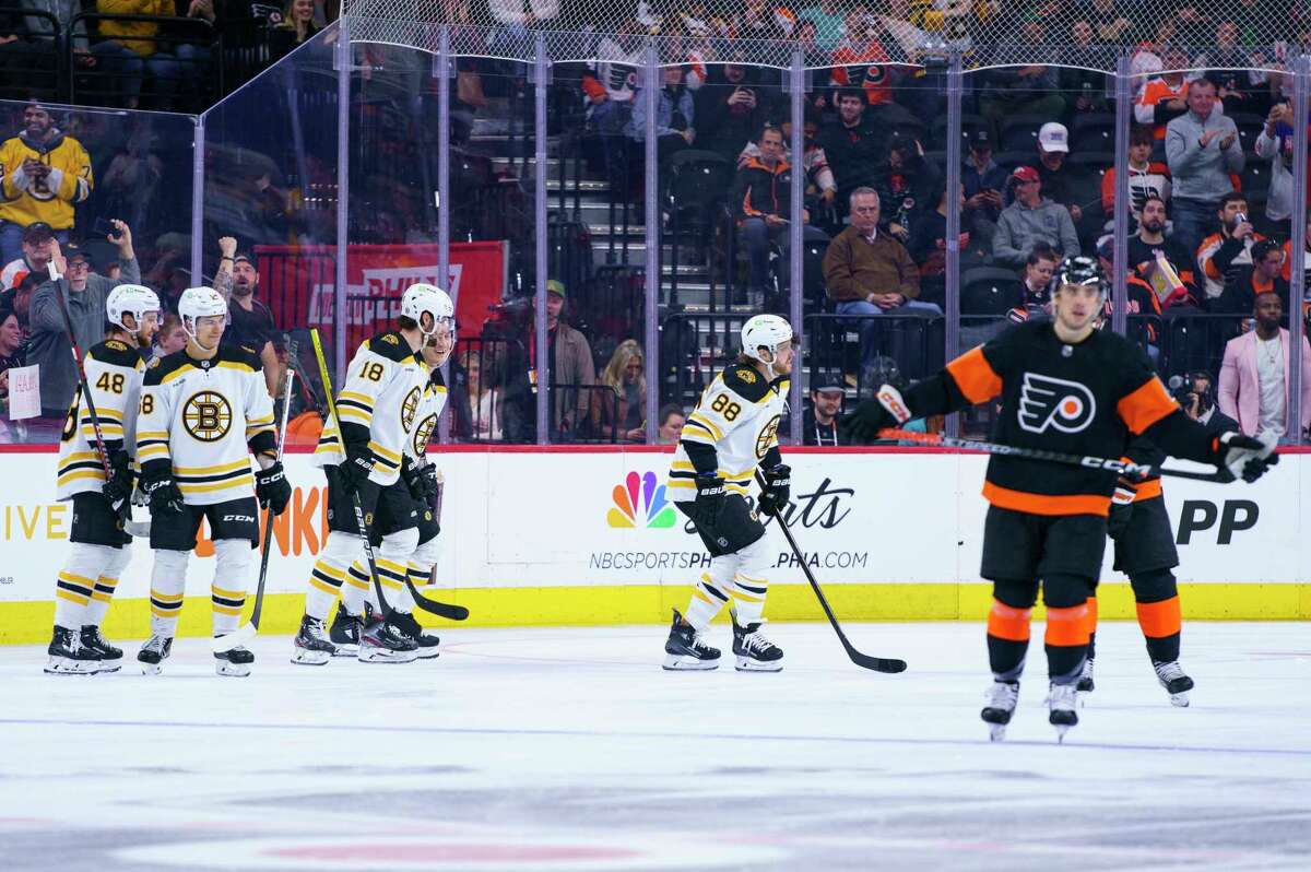 Charlie Coyle's shootout goal helps Bruins reach 60-win mark - ESPN
