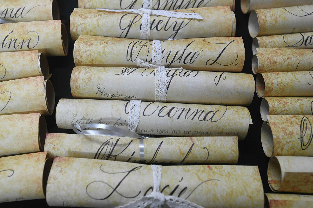 Scrolls bearing messages for each mom were handed out during the 2nd Annual Orange County Community Baby Shower at Destiny Church in Orange. Photo made Saturday, April 8, 2023 Kim Brent/Beaumont Enterprise