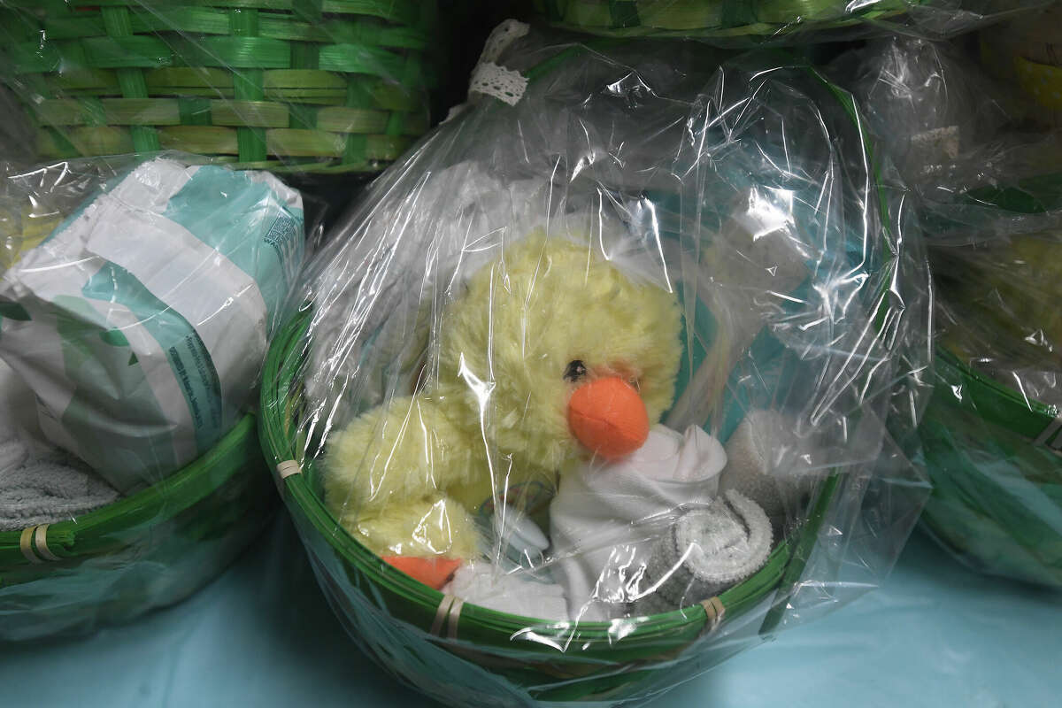 An Easter themed gift basket sits on a table filled with items to be distributed during the 2nd Annual Orange County Community Baby Shower at Destiny Church in Orange. Photo made Saturday, April 8, 2023 Kim Brent/Beaumont Enterprise